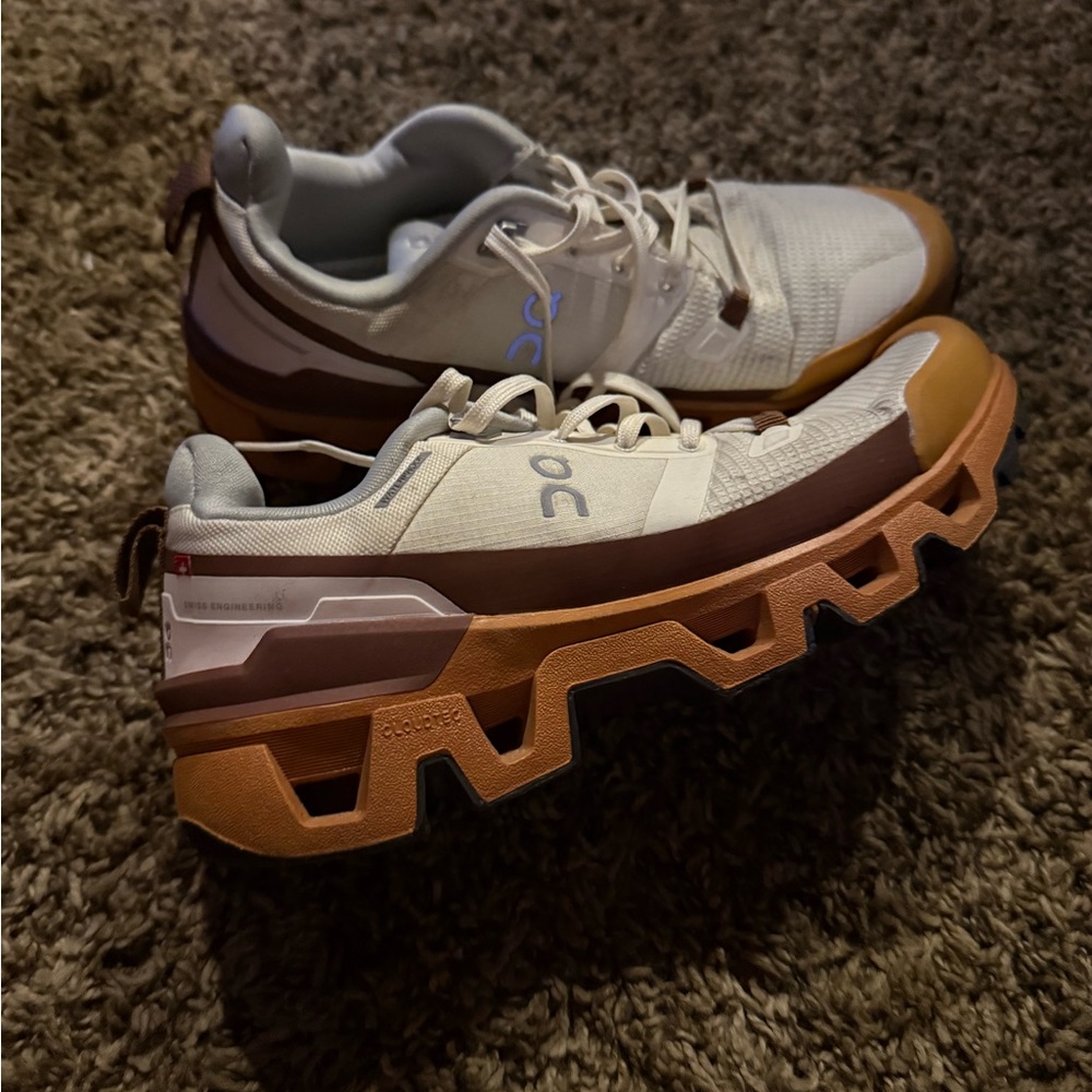 On Running Cream and Tan Athletic Shoes